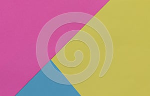 Creative geometric paper background. Pink, blue, yellow colors.