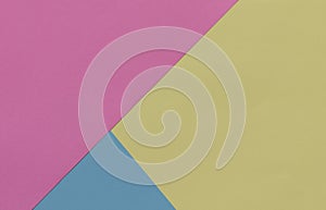 Creative geometric paper background. Pink, blue, yellow colors.