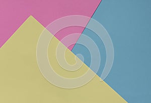 Creative geometric paper background. Pink, blue, yellow pastel