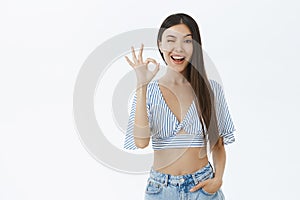 Creative girl assuring she will make everything perfectly. Portrait of happy chill and relaxed confident young woman in