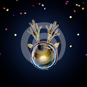 Creative golden Christmas deer with antlers, black background. New Year concept