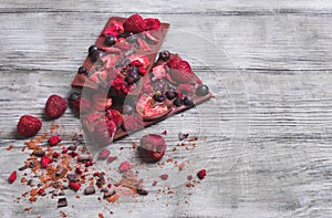 Creative handmade chocolate with fresh and dried berries