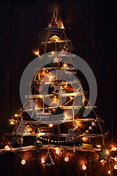 Creative handmade christmas tree illuminated in the dark