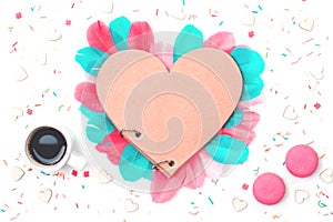 Creative heart with colorful feathers, flat lay