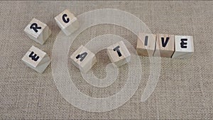 Creative Ideas word made with building wooden cube blocks