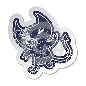 distressed old sticker of a kawaii cute demon