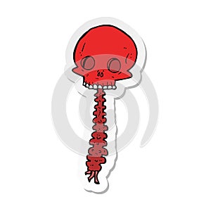 sticker of a spooky cartoon sull and spine photo