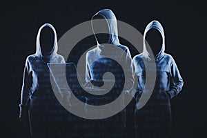 Creative image of a group of hackers in hoodies standing on abstract dark coding background. Malware, phishing and theft concept.