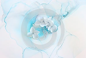Creative image of pastel blue Hydrangea flowers on artistic ink background