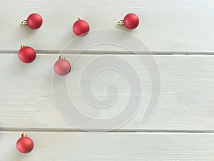 Creative image of a red ornaments a background of whiteboards.Christmas holiday, New Year 2020.Place for your text.
