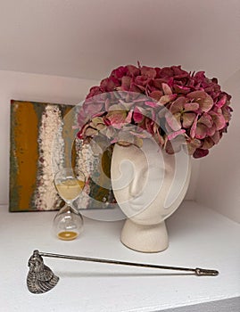 Artistic Vase Head with Dried Hydrangeas and Hourglass Decor