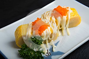 Creative Japanese food  Japanese sweet egg topped with salad dressing and Shrimp eggs, Nigiri Sushi food