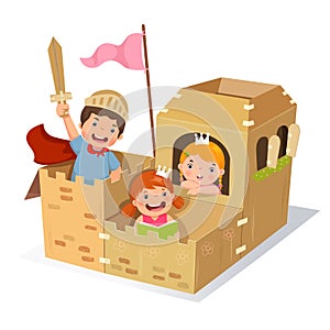 Creative kids playing castle made of cardboard box
