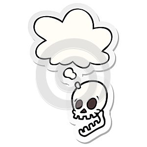 A creative laughing skull cartoon and thought bubble as a printed sticker