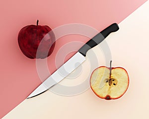 Creative layout made of Apple with stainless kitchen knives on p