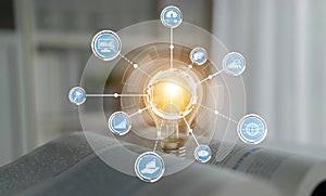 Innovative Light Bulb Concept with Digital Icons and Data Visualization Elements Representing Knowledge and Technology