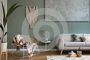 Creative living room interior design composition with grey scandi sofa, rattan armchair, plants, carpet.
