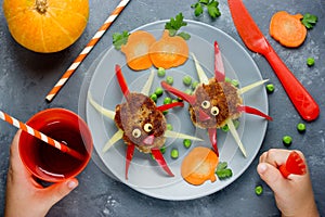 Creative lunch for your child spider cutlet with vegetables