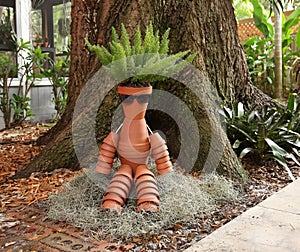 Creative man made out of clay pots