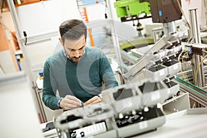 Mechanical engineer working on machines