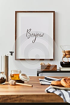 Creative minimalistic dining room interior design with mock up poster frame, dining table and cozy personal accessories.