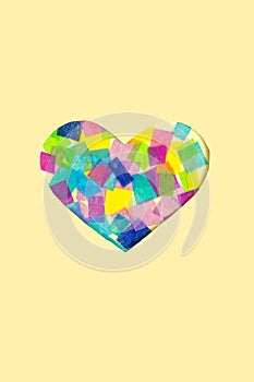 Creative mockup with paper cut heart and multicolored patchwork. yellow pastel background for copy space