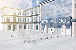 Creative modern high school building exterior with benches, glass with reflections and daylight.
