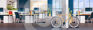 Creative office coworking center room interior modern workplace desk bicycle ecological transport horizontal banner flat