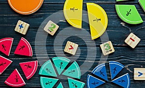 Creative Ð¡olorful math fractions on dark background. Interesting funny math for kids. Education, back to school concept