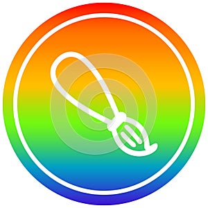 A creative paint brush circular in rainbow spectrum
