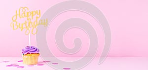Creative pastel fantasy holiday card with cupcake and happy birthday topper. Baby shower, birthday, celebration concept.