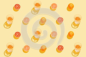 Creative pattern made with sliced grapefruit, blood orange and glass with lemonade or water on yellow background. Summer fruit and