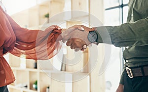 Creative people, handshake and partnership in meeting, b2b deal or teamwork together at office. Closeup of man and woman