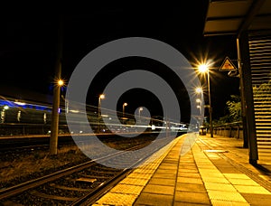 Creative perspective on a railstation in the night