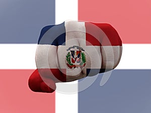 Creative photo of a hand with the national flag of the Dominican Republic