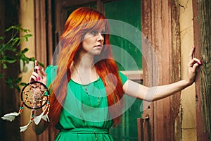 Creative Portrait of Redhead Woman in Green Dress