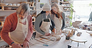 Creative pottery class, senior couple and teacher working together. Art, creativity and education, retirement hobby with