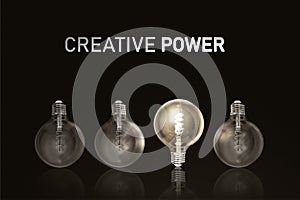 Creative Power , illuminated light bulb row dim ones concept solution