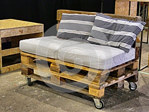 Creative re-use of storage and delivery woodden pallets for handcrafted sofa