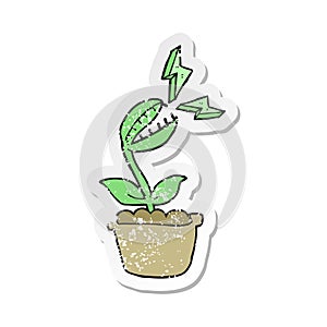 A creative retro distressed sticker of a cartoon venus fly trap