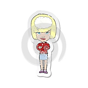 A creative retro distressed sticker of a cartoon woman with folded arms imagining