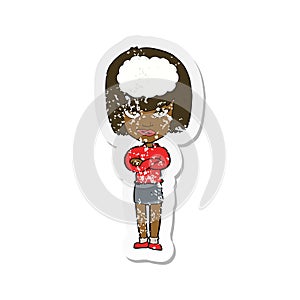 A creative retro distressed sticker of a cartoon woman with folded arms imagining