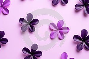 Creative set of bright summer flowers in a frame with copy space on purple background.