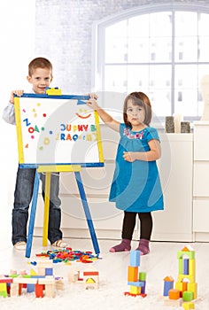 Creative small kids with drawing board