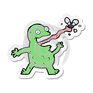 A creative sticker of a cartoon frog catching fly