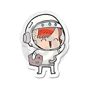 A creative sticker of a cartoon happy spacegirl holding moon rock