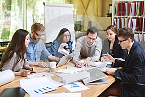 Creative team of professionals at the table.