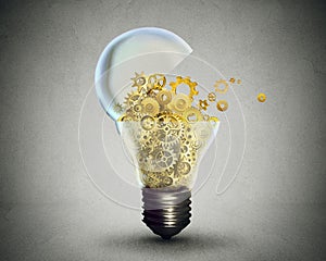 Creative technology communication concept lightbulb with gears