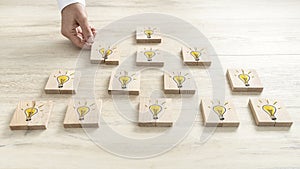 Creative thinking concept with a businessman arranging a series