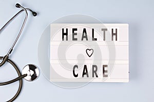 Creative Top view flat lay lightbox with the text health care